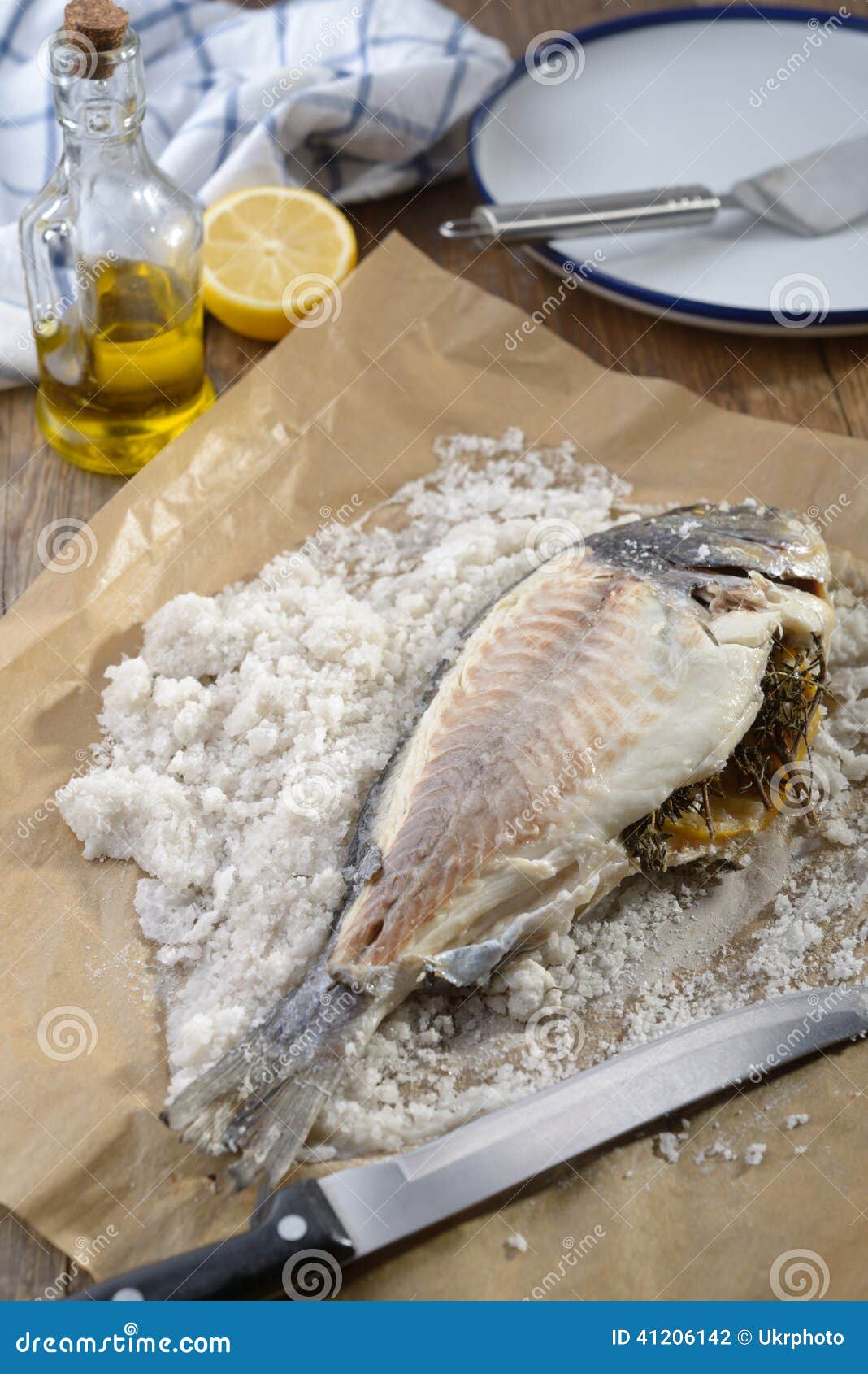 Sea bream baked in salt stock photo. Image of meal, gilt 41206142