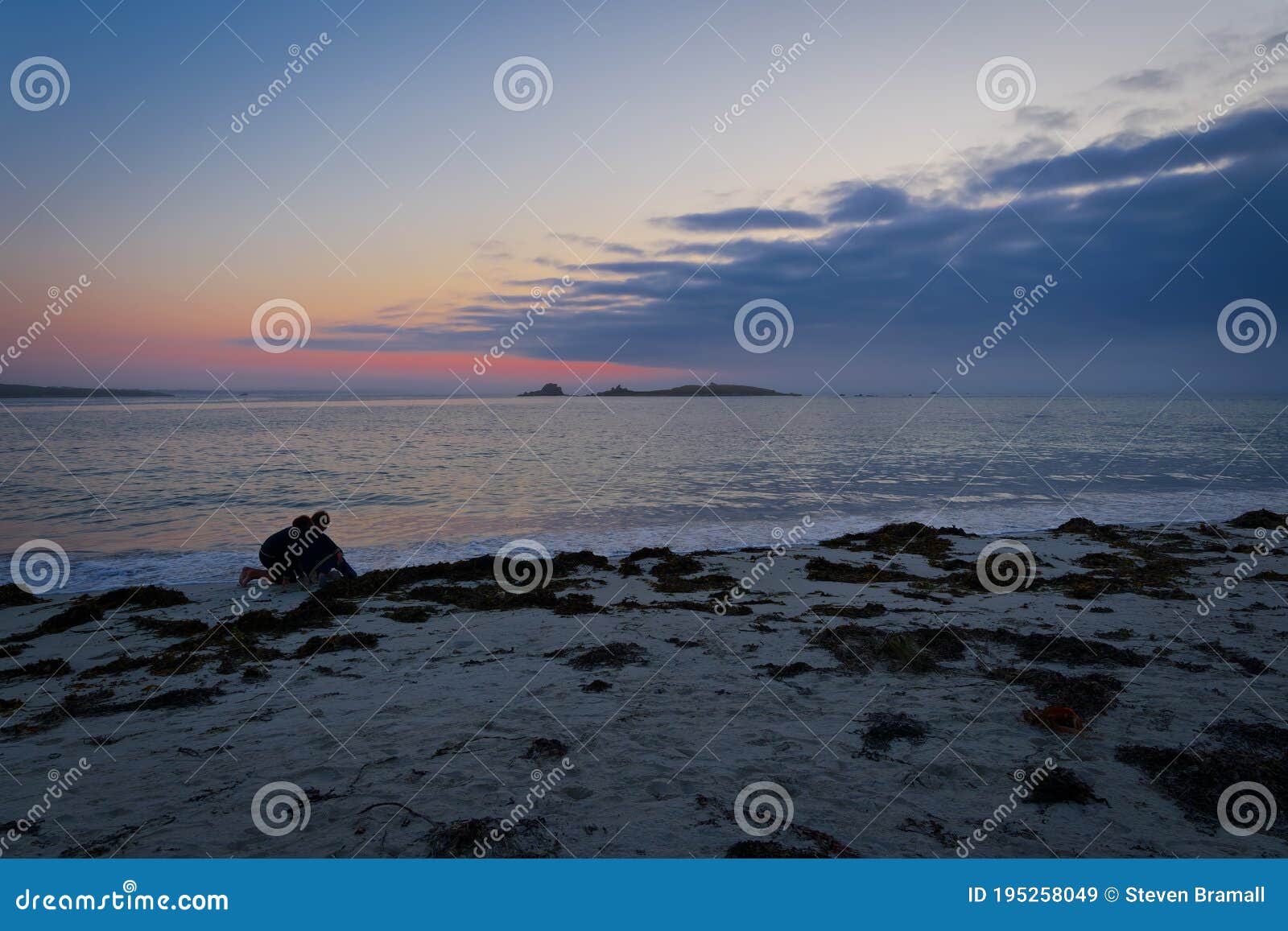 beside the celtic sea in landeda, brittany at sunset.