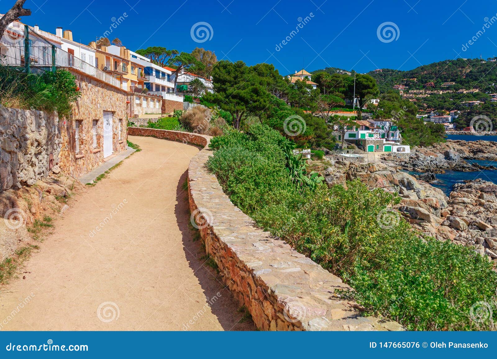 sea landscape with road near calella de palafrugell, catalonia, spain near barcelona. scenic village with nice sand beach and
