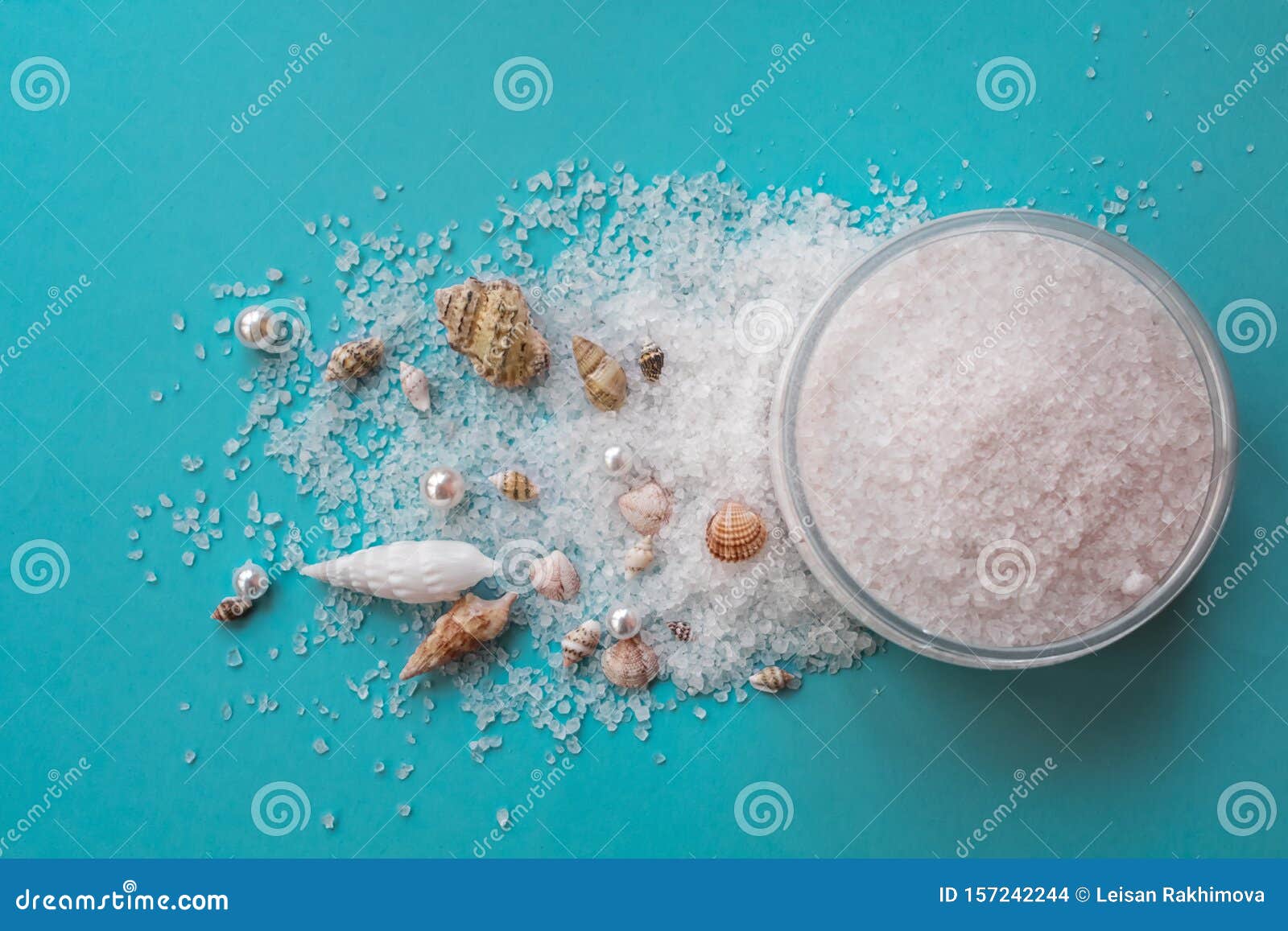 Sea Salt for Exfoliation on Background with Sea Shells Stock Photo