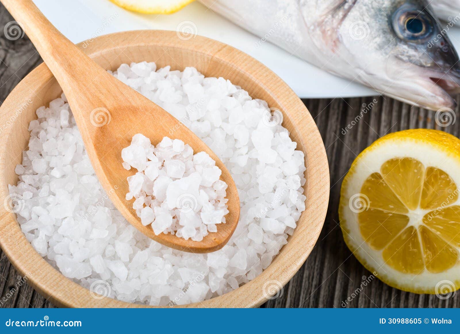 Sea salt with fish closeup stock image. Image of care 30988605