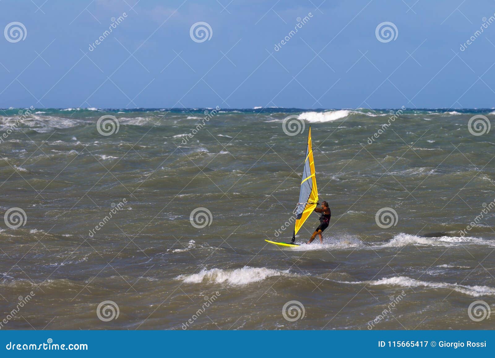 Sea Waves and Wind Surfing in the Summer in Windy Day Editorial