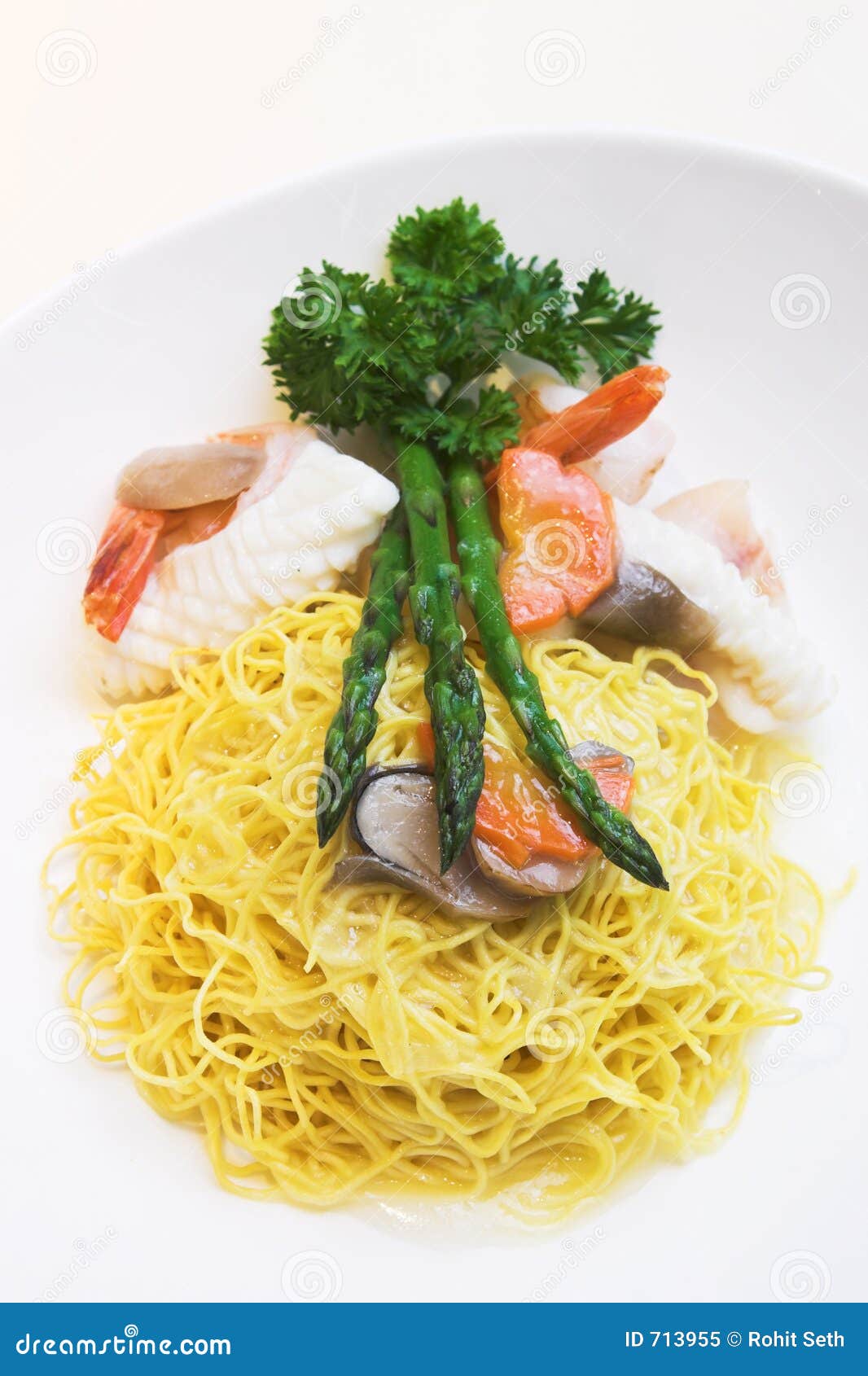 Seafood Fried Rice. Cooked White Rice Seasoning, Shrimp, Sliced Squid