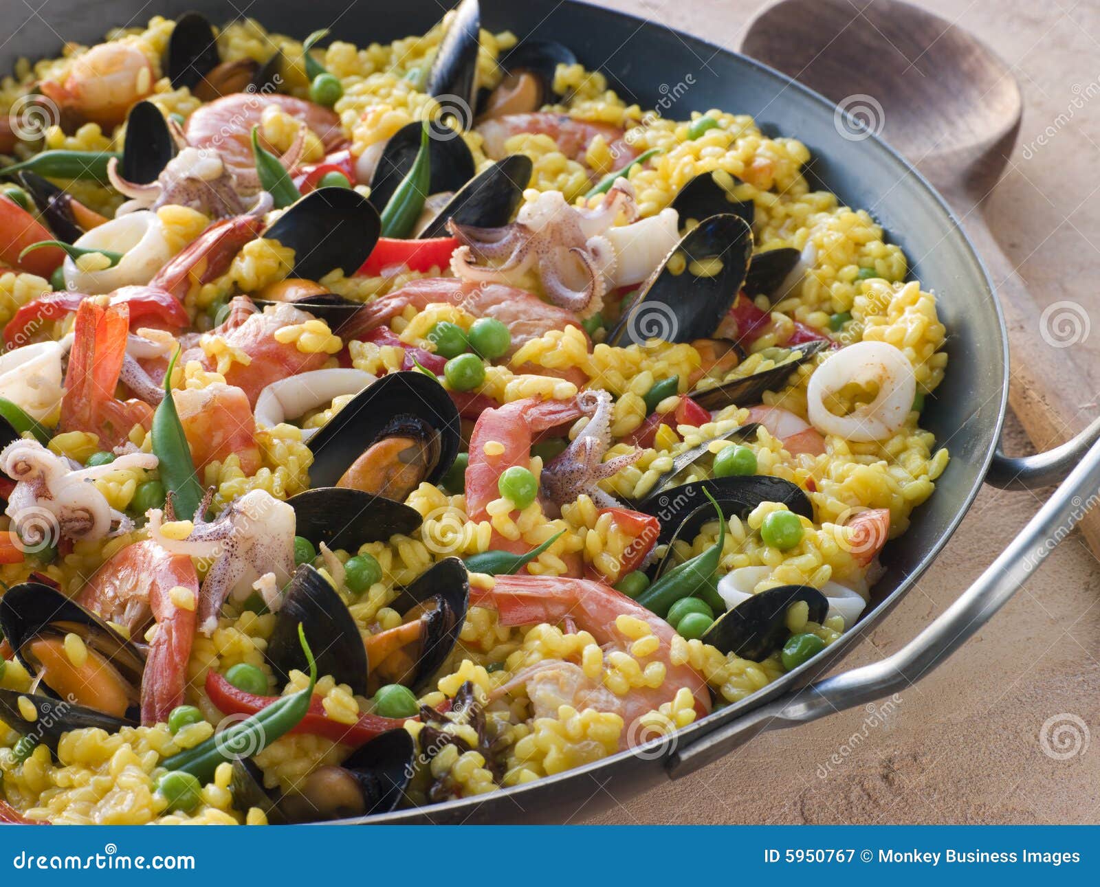 Seafood Paella With Scampi And Prawns As Typical Spanish Food Stock seafood-paella-with-scampi-and-prawns-as-typical-spanish-food-stock