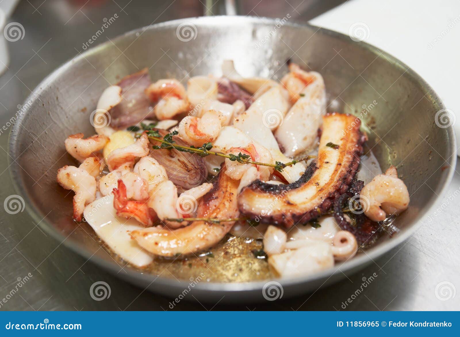 Seafood stir fried on pan stock image. Image of protein 11856965