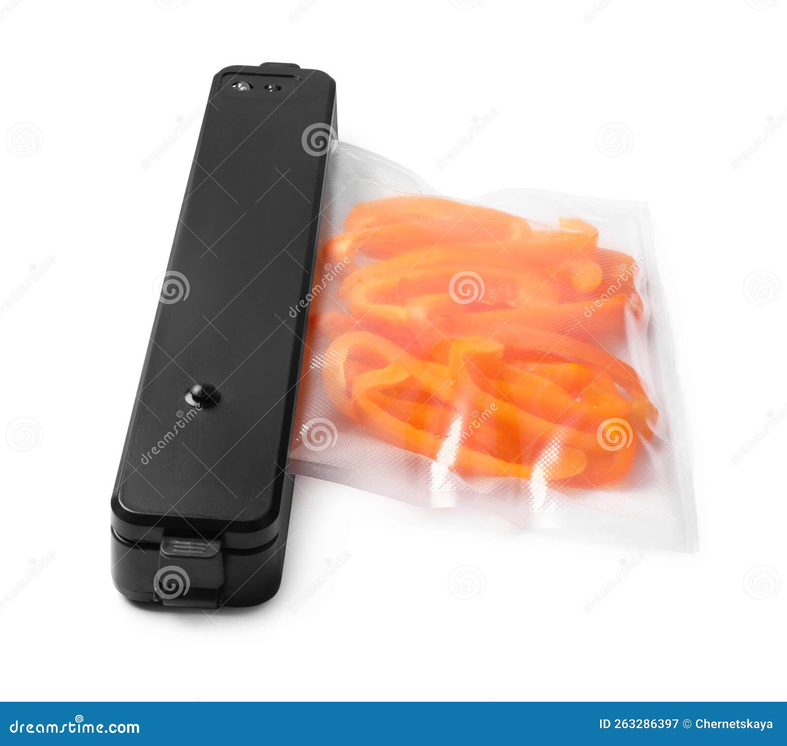 Sealer for Vacuum Packing and Plastic Bag with Bell Pepper on White