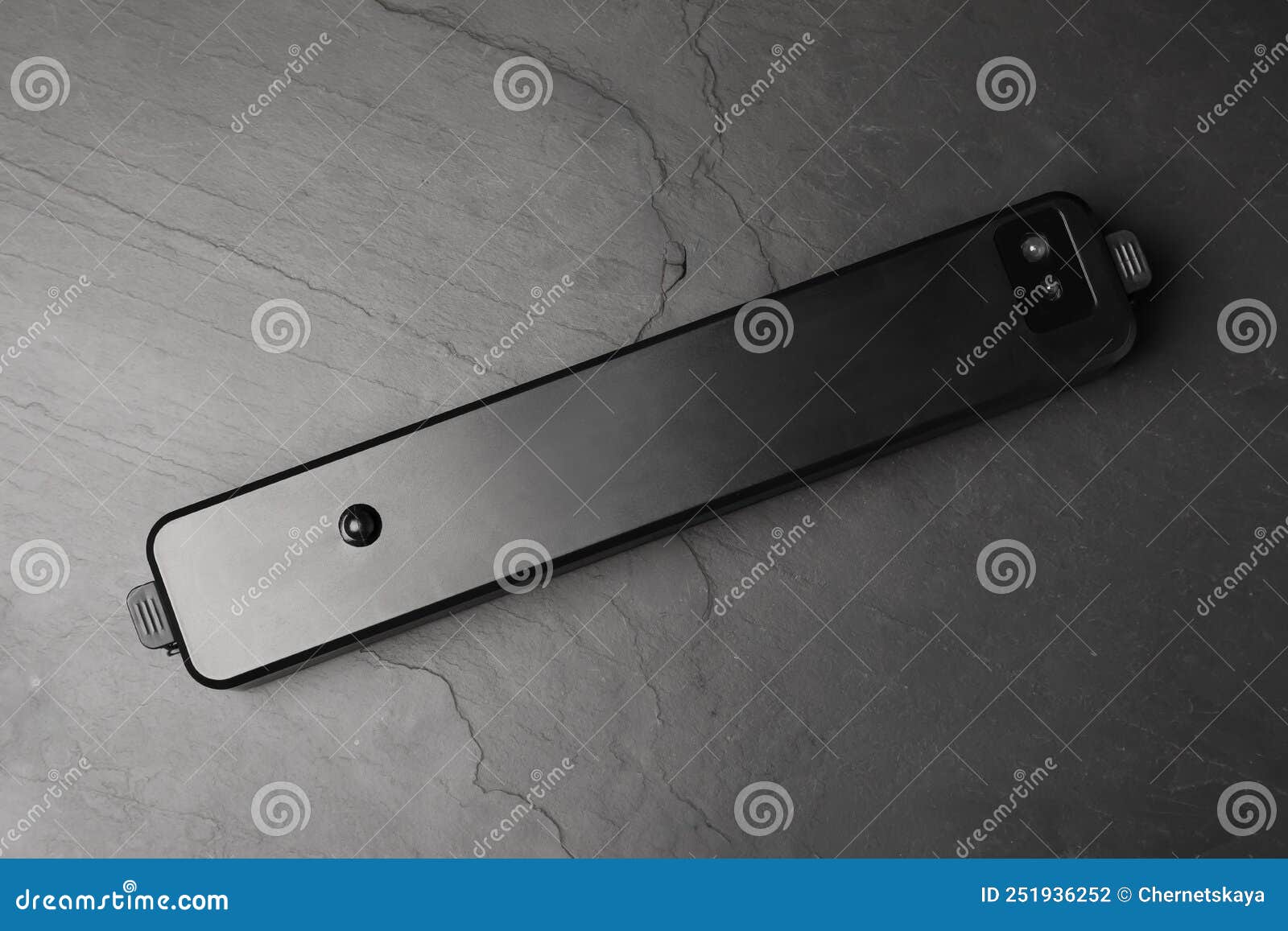Sealer for Vacuum Packing on Slate Table, Top View Stock Photo Image