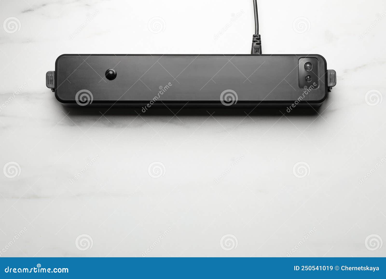 Sealer for Vacuum Packing on White Marble Table, Top View. Space for