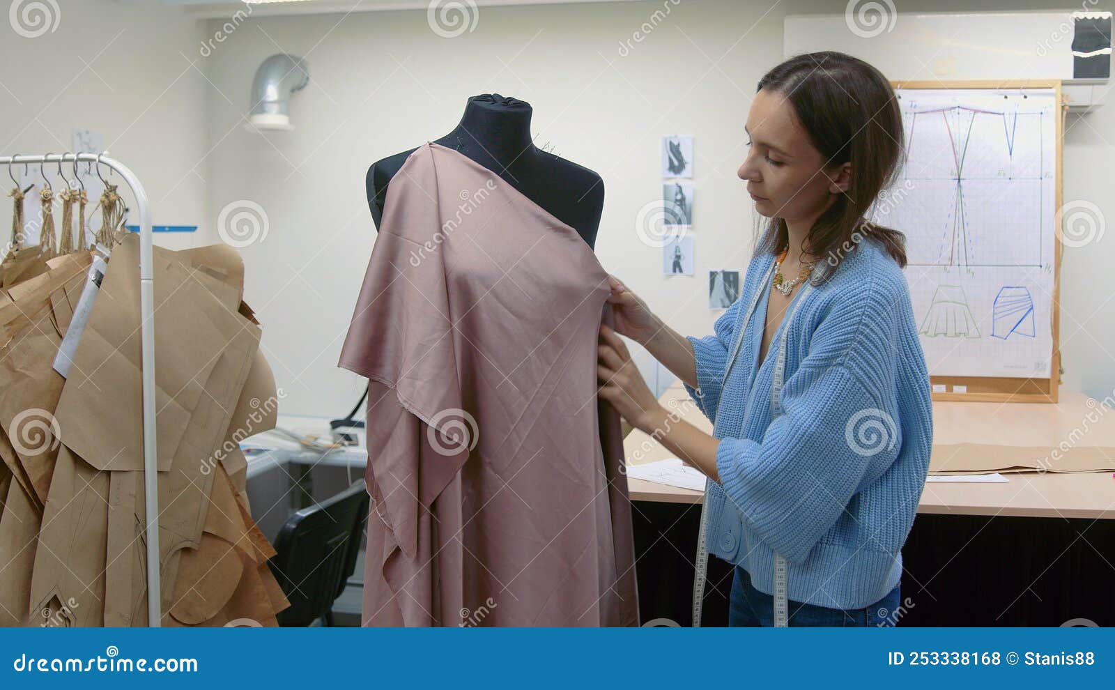 4K. Seamstress Creates an Individual Dress in the Workshop Stock Photo ...