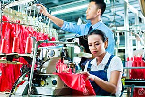 Seamstress And Shift Supervisor In Textile Factory Stock Image Seamstress And Shift Supervisor In Textile Factory Stock Image