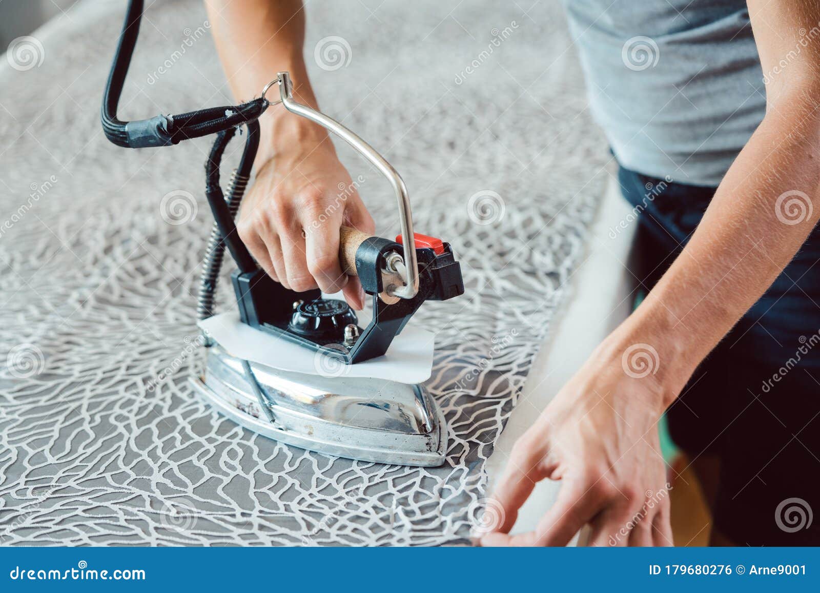Tailor ironing fabric stock photo. Image of fabric, ironing 179680276