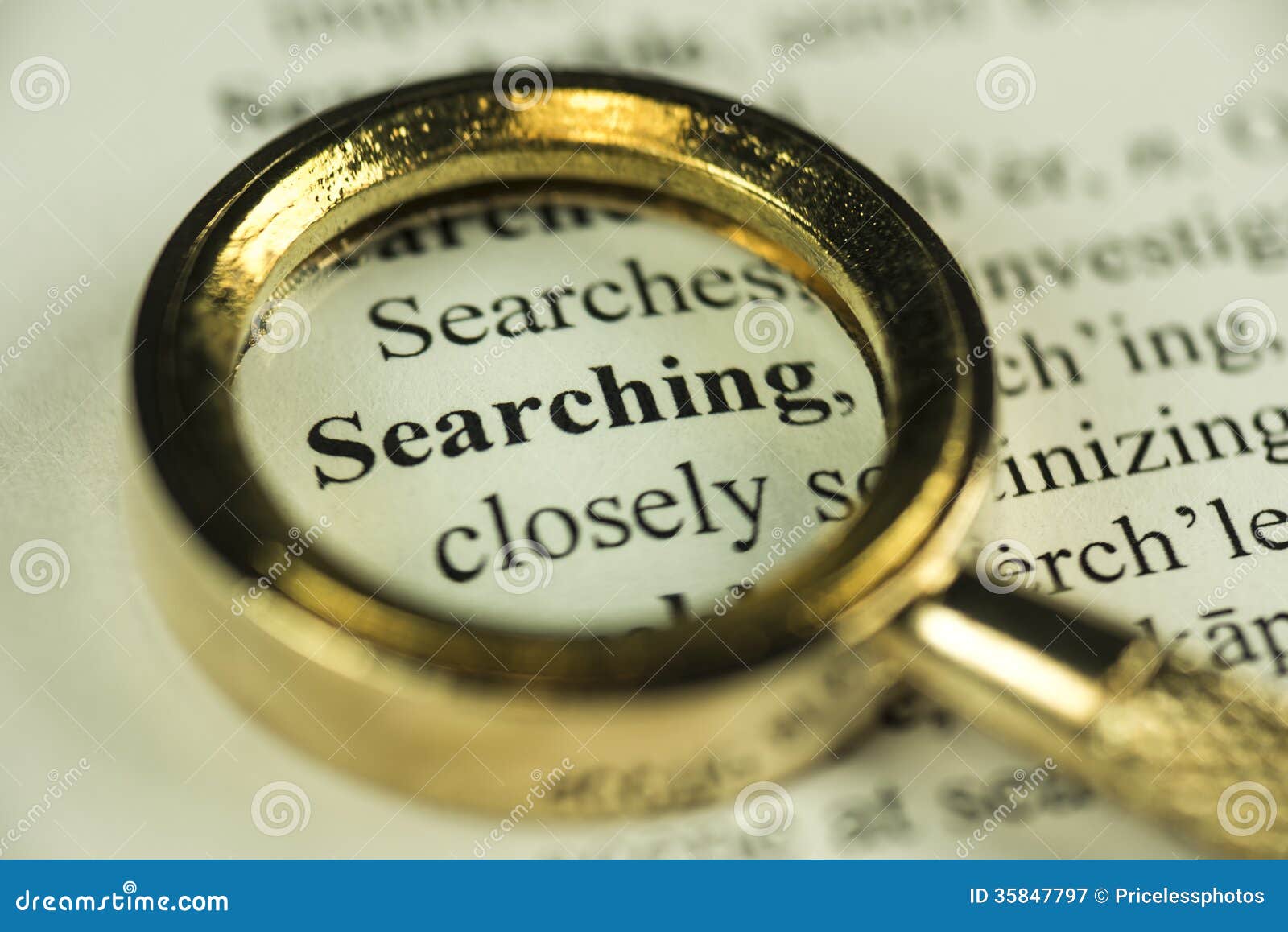 searching concept with closeup golden magnifying glass