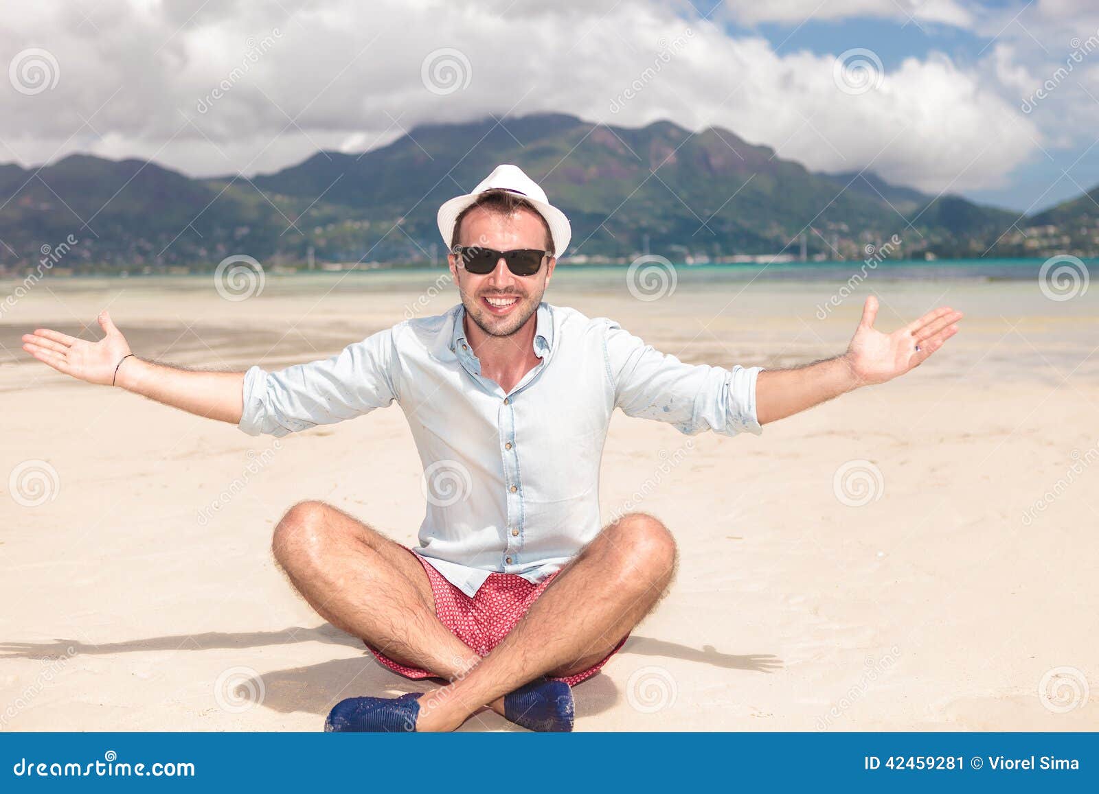 Seated Happy Young Man Invites You To the Beach Stock Image - Image of ...