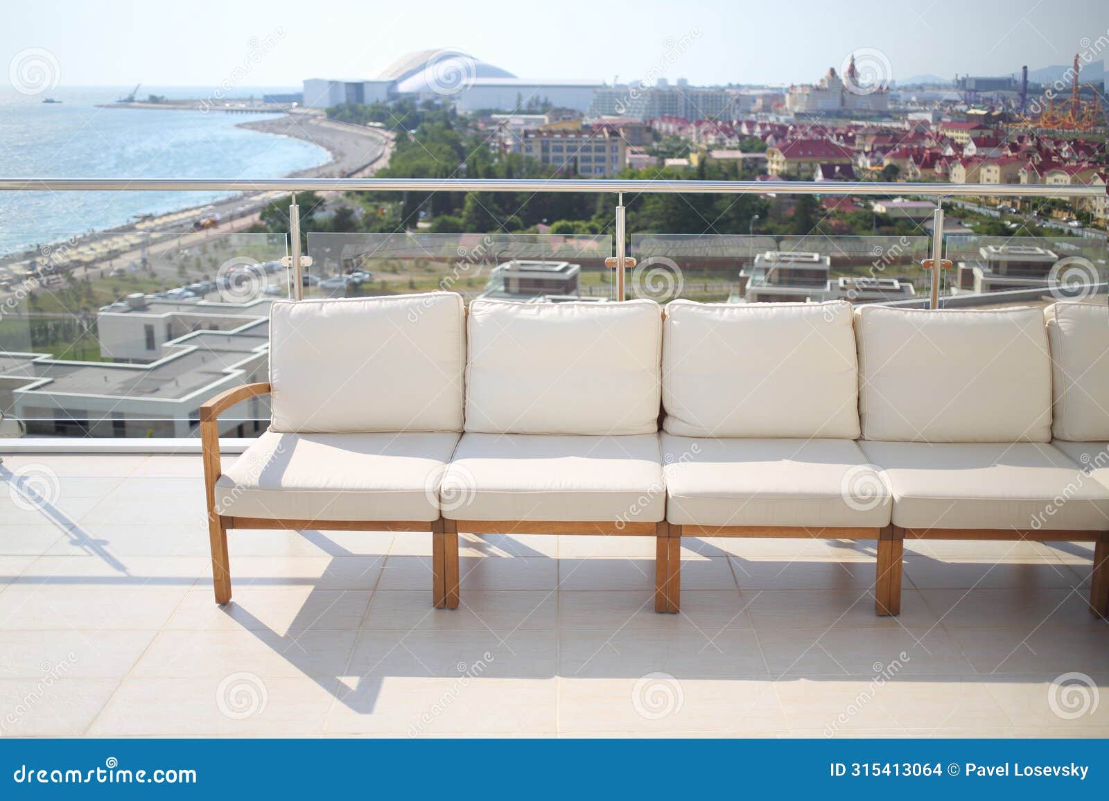 seating area with beige sofa on the rooftop