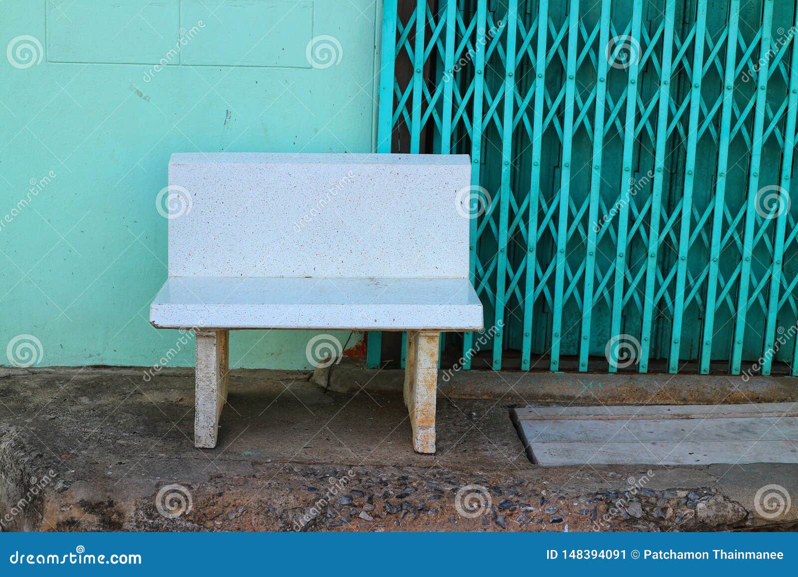 Seating Chairs On The Cement Floor Green Wall Background Asian