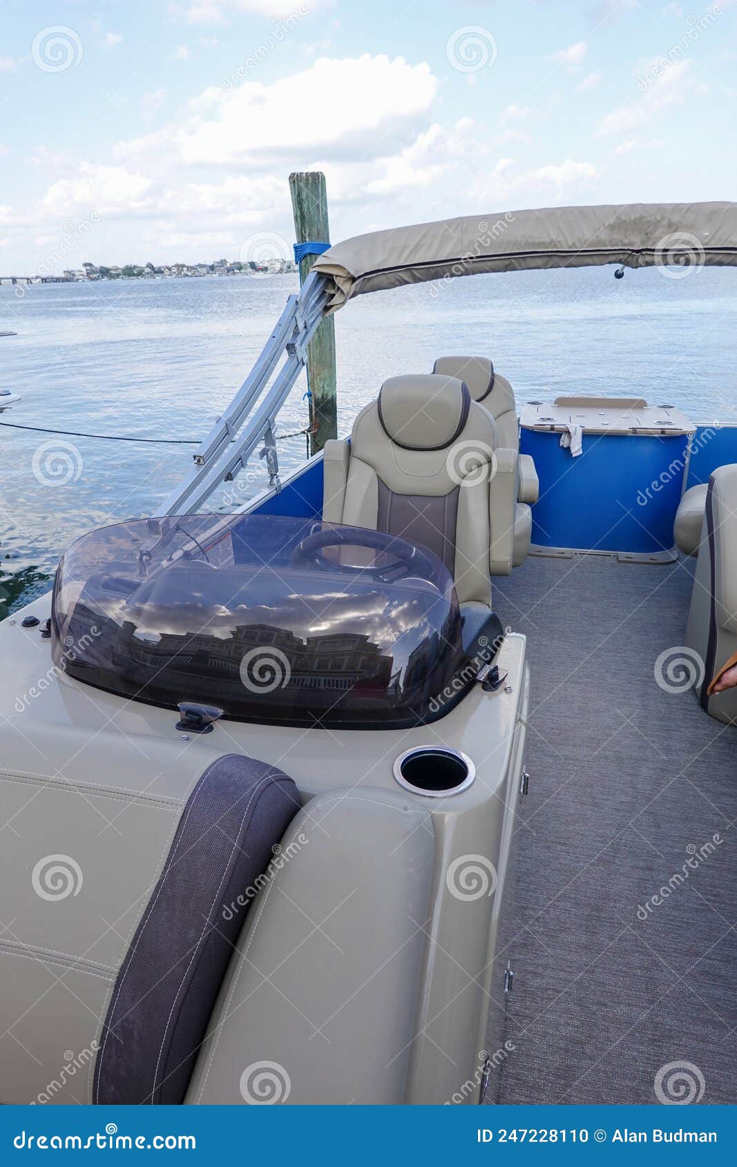 Seats and Steering Wheel on a Flat Pontoon Boat on the Water Stock Photo Image of light, ocean