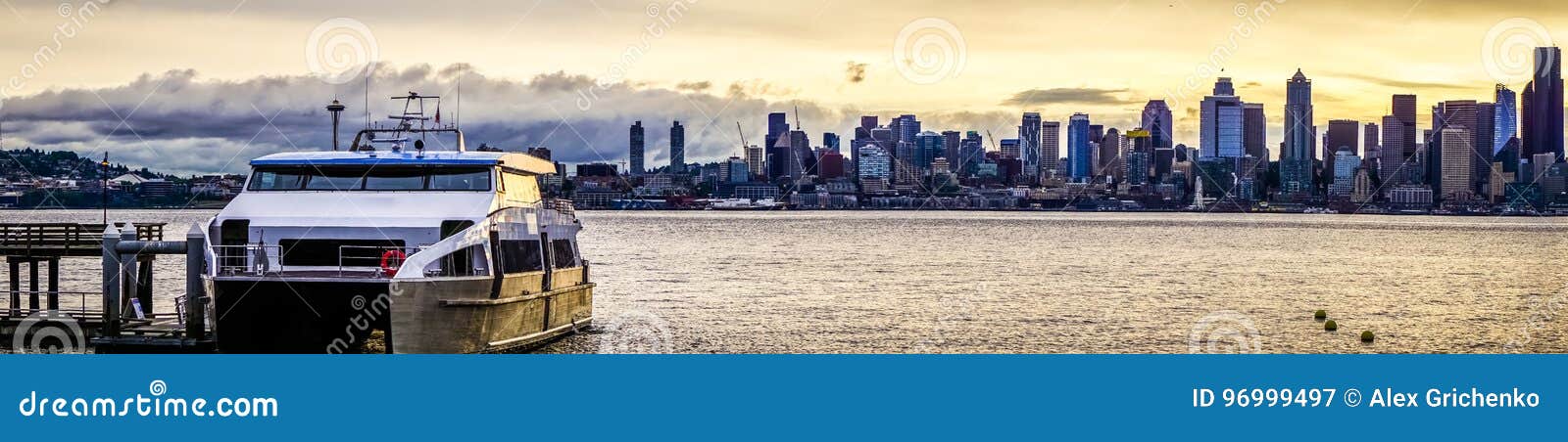 seattle city skyline early morning with watercraft in foreground