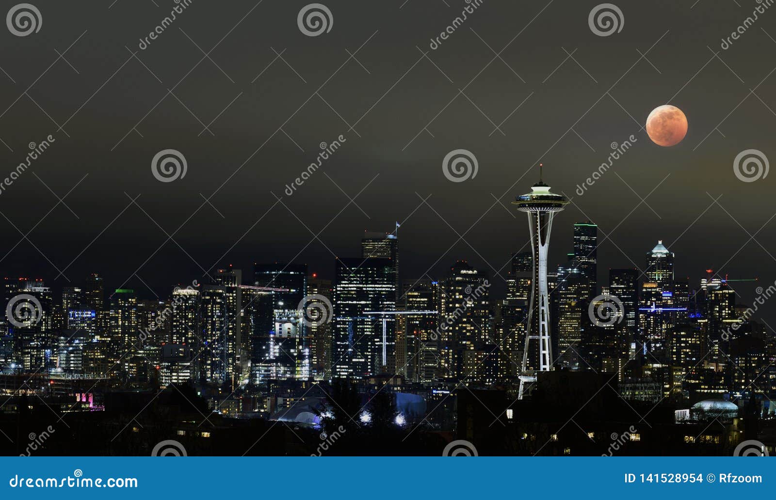 Seattle Downtown at Night with Lunar Eclipse Editorial Stock Image