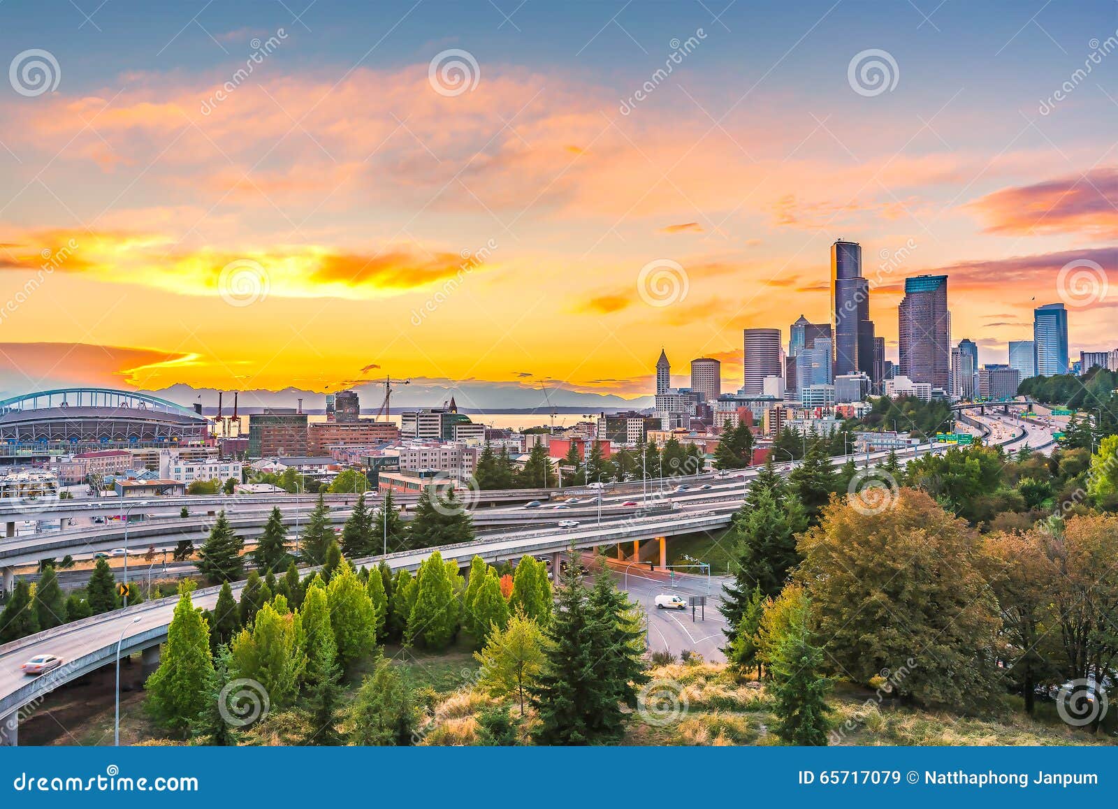 seattle skylines and interstate freeways converge with elliott bay and the waterfront background of in sunset time, seattle, washi