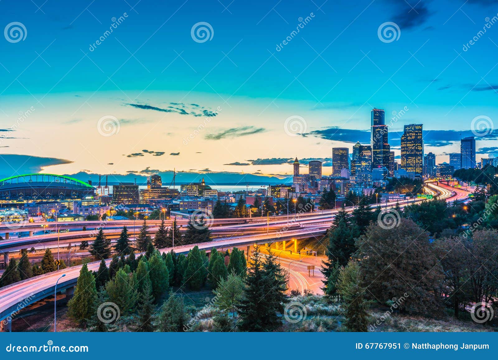 seattle skylines and interstate freeways converge with elliott bay and the waterfront background of in sunset time, seattle, washi