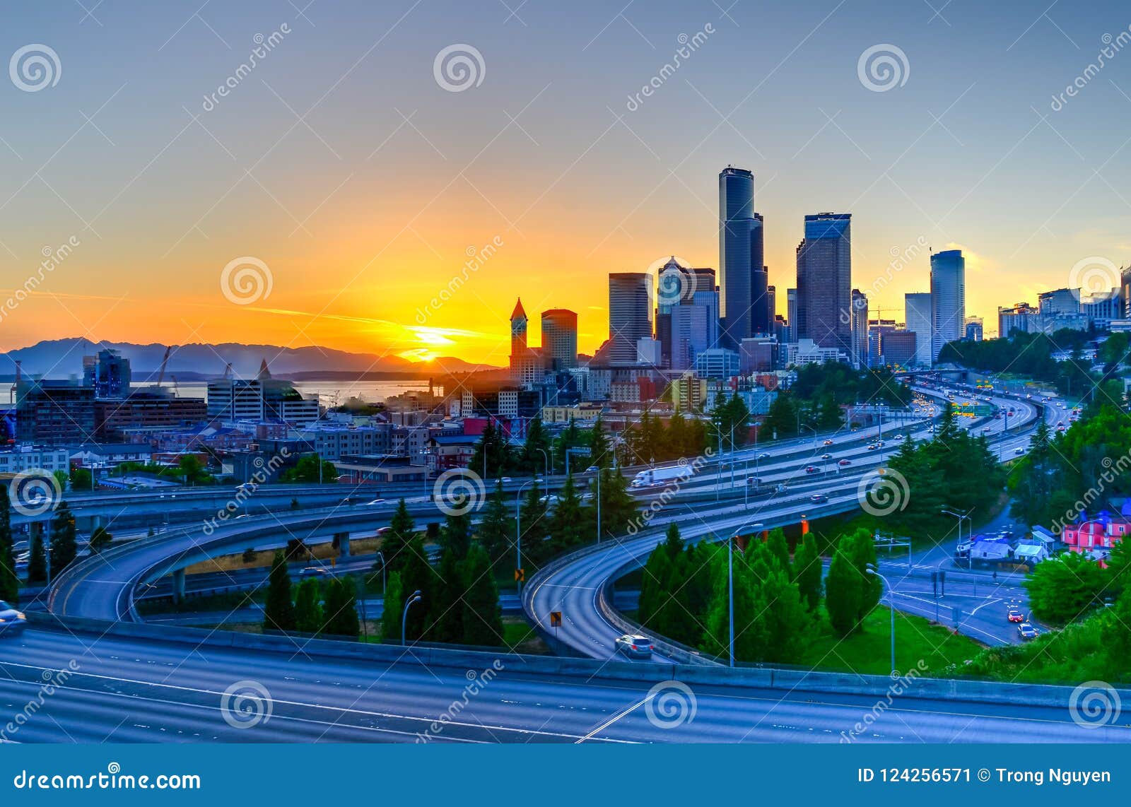 seattle skylines and s-curved i-90, i-5 interchange during sunset
