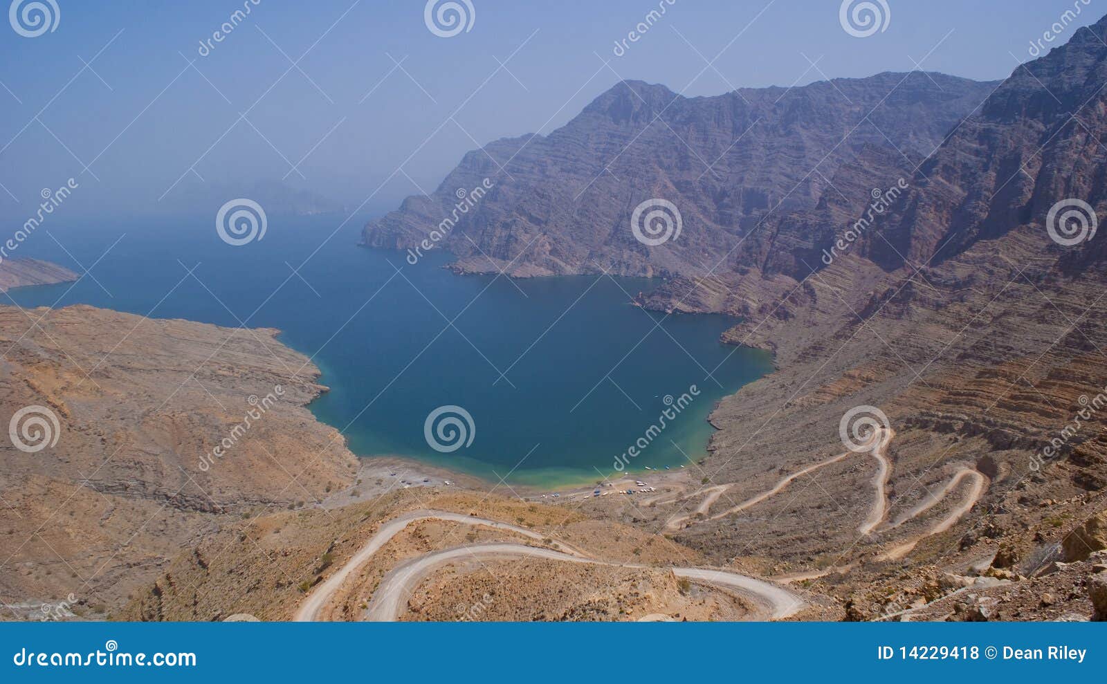 secluded beach in the oman mountains