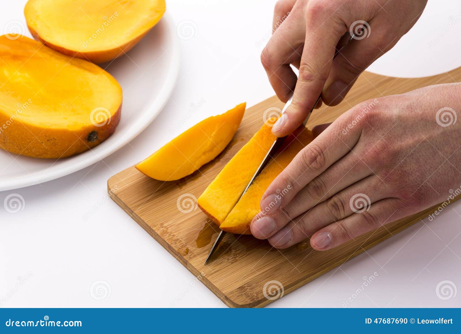 Second Cut through One Third of a Trisected Mango Stock Photo Image