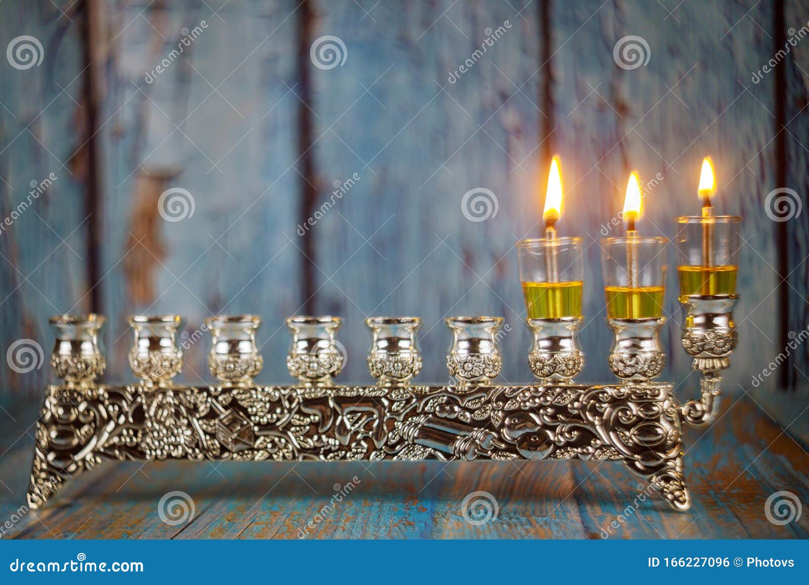 Second Day Hanukkah Candles are Burning on Light of the Jewish Holiday