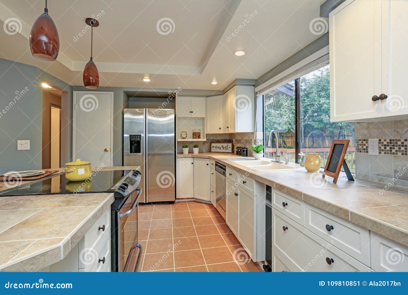 Second Floor Kitchen Boasts Tray Ceiling Island Stock Image