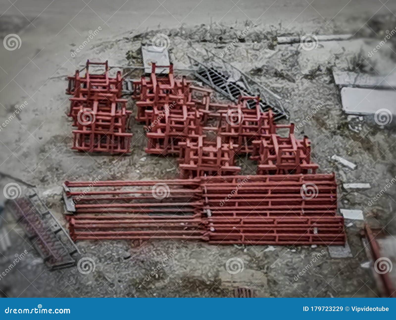 Secondhand Building Metal Structures Stacked at a Construction Site