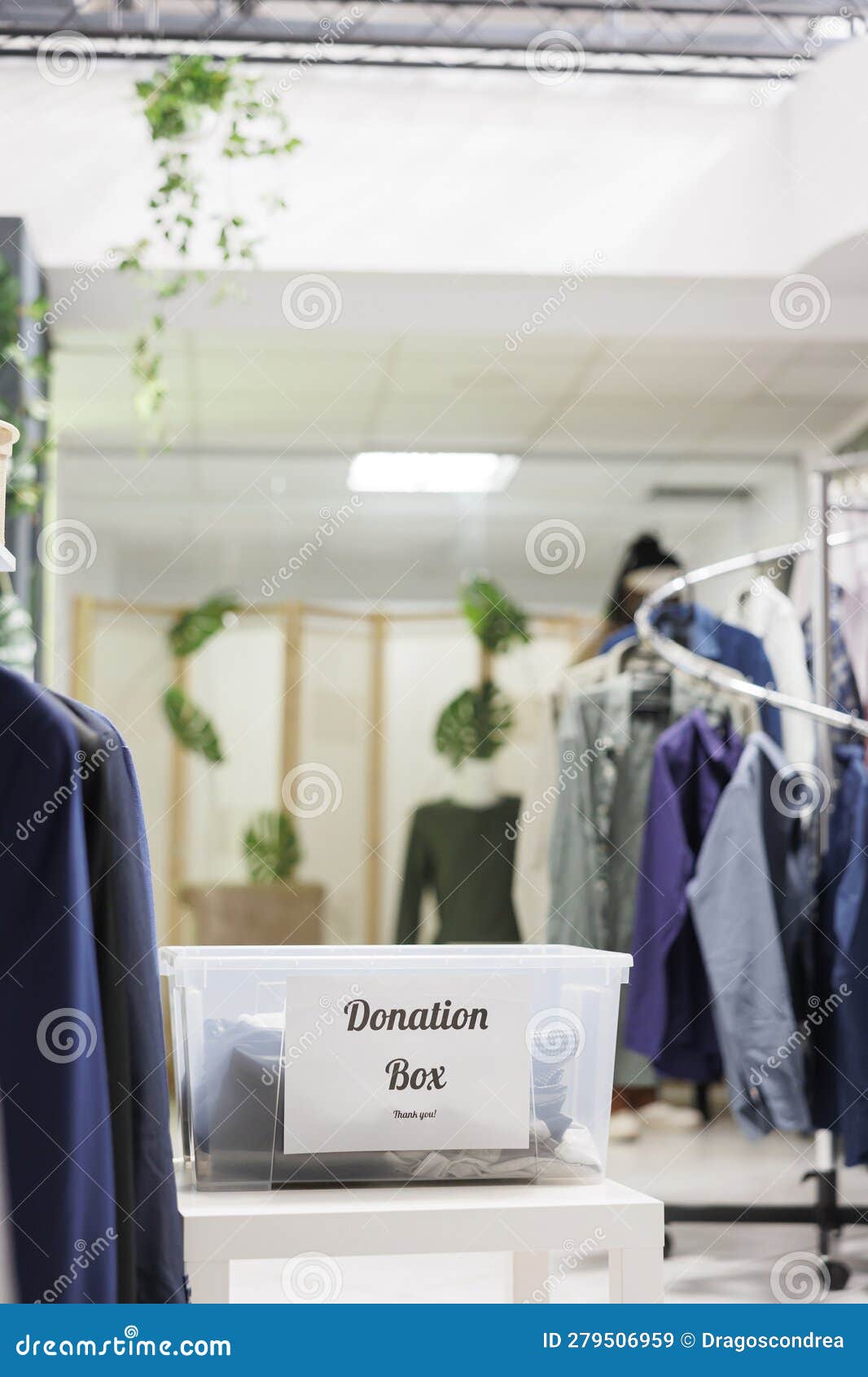 Second Hand Clothes in Donation Box in Shopping Center Stock Image