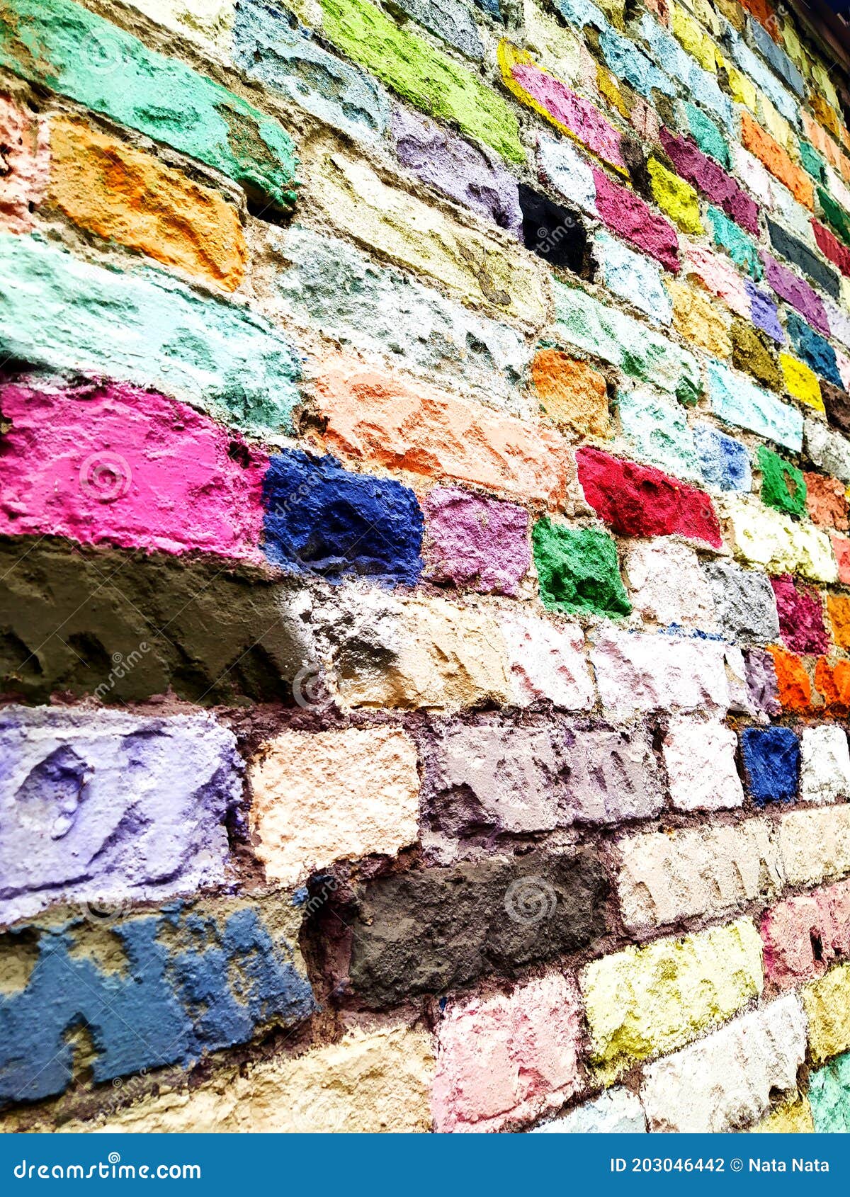 A Section of a Brick Wall, Which are Painted with Different Paint