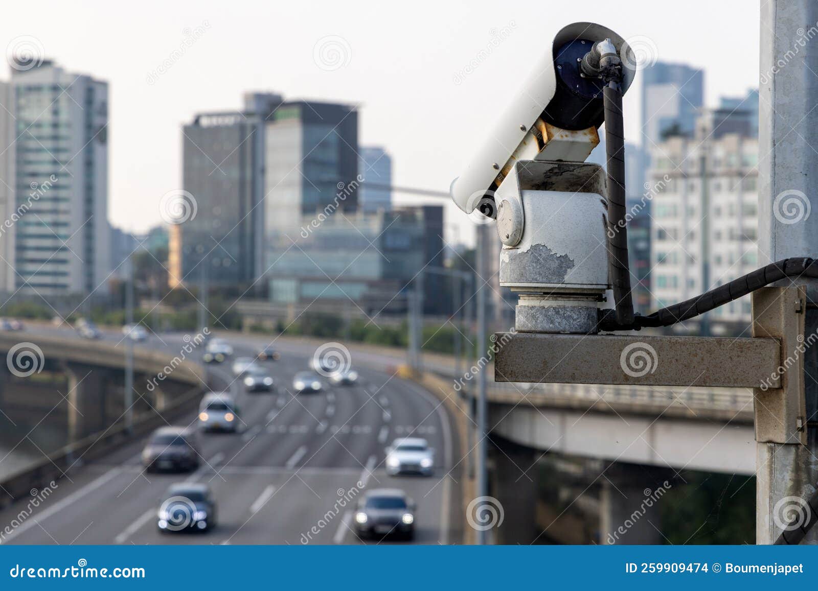 Closeup of Traffic Security Camera Surveillance CCTV on the Road in the Big City Stock Photo