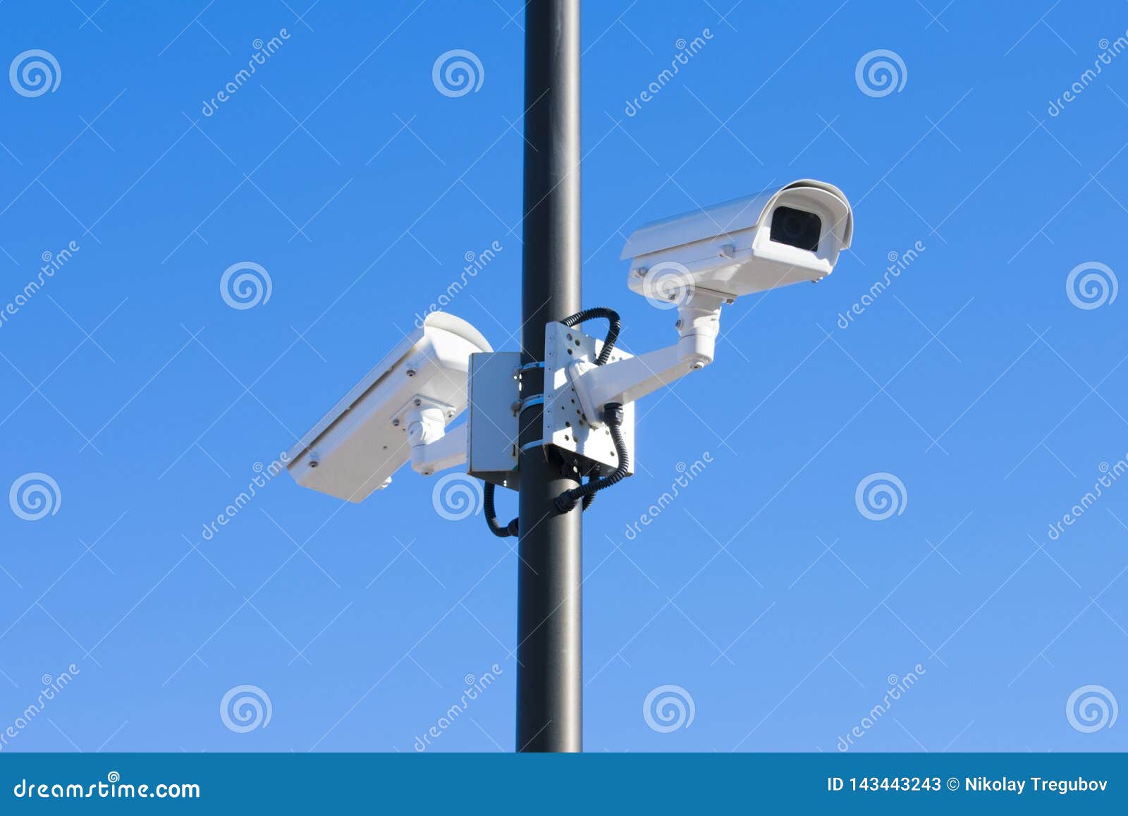 Security Cameras on the Background of a Clear Sky Stock Image Image