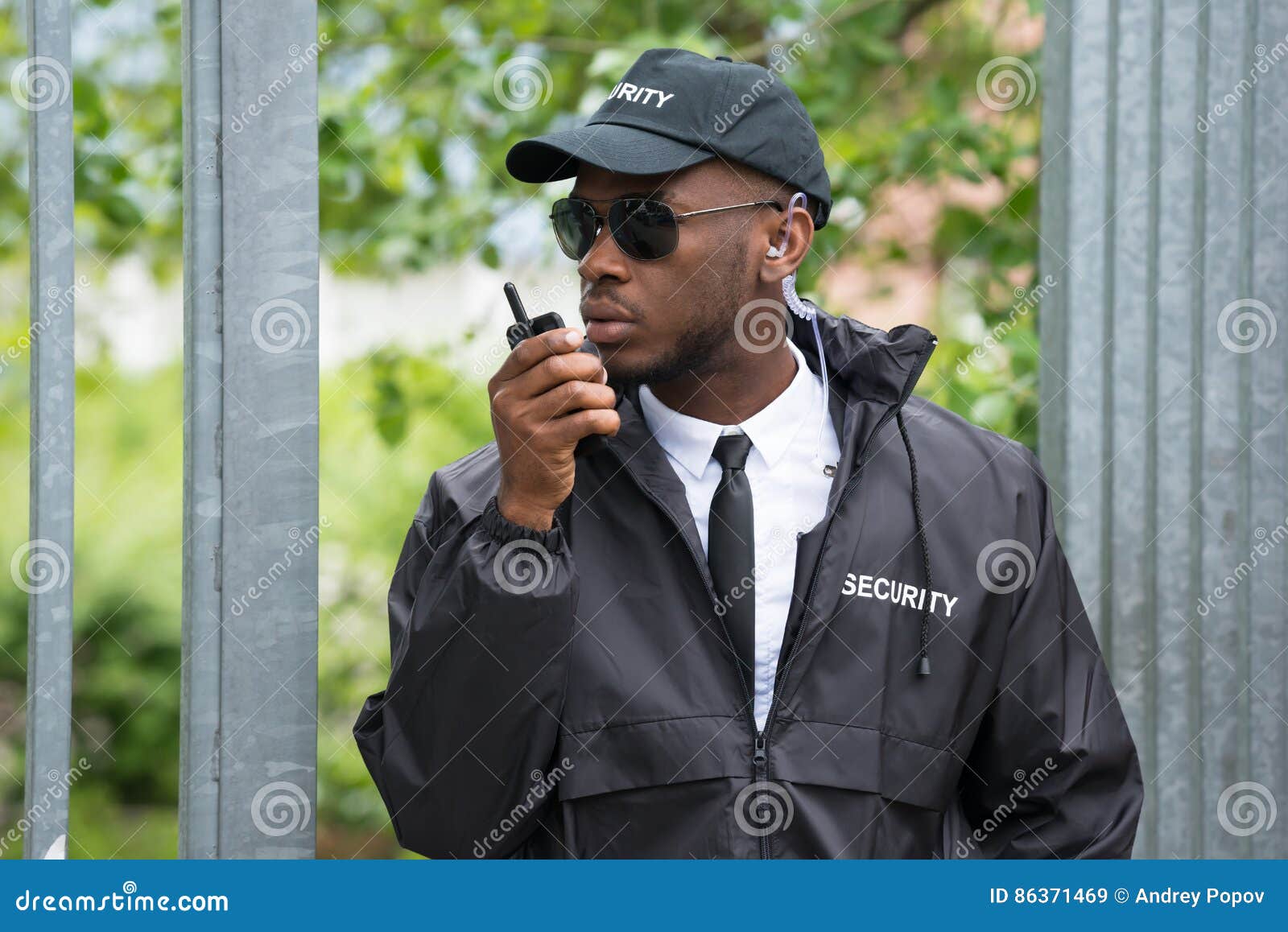 security guard using walkie-talkie