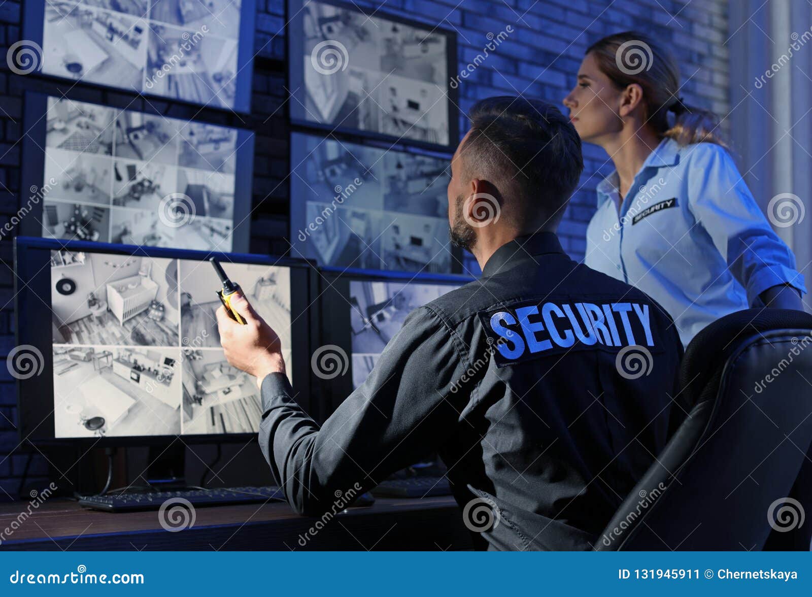security guards monitoring modern cctv cameras