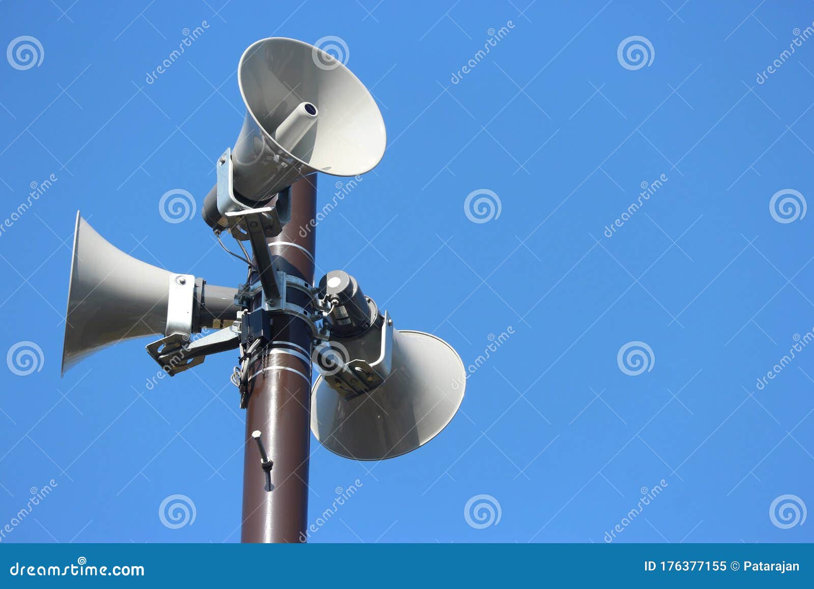 security speakers tower for warning or announce with clear blue sky background.