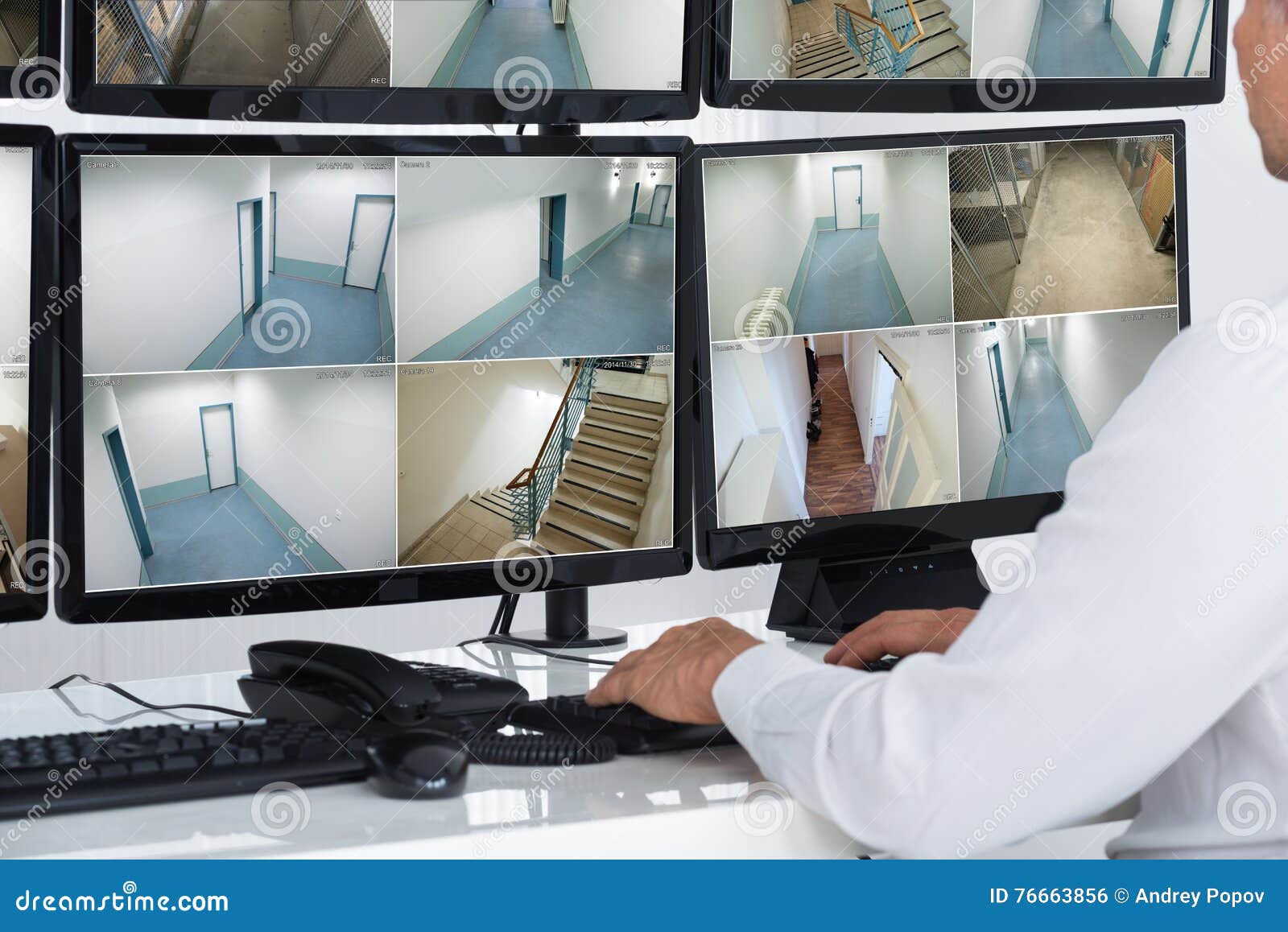 security system operator looking at cctv footage