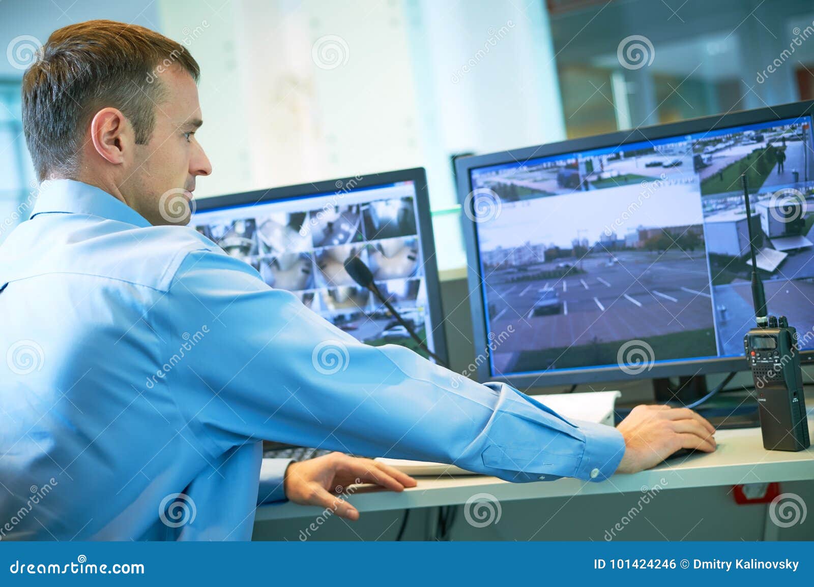 Security Worker during Monitoring. Video Surveillance System. Stock