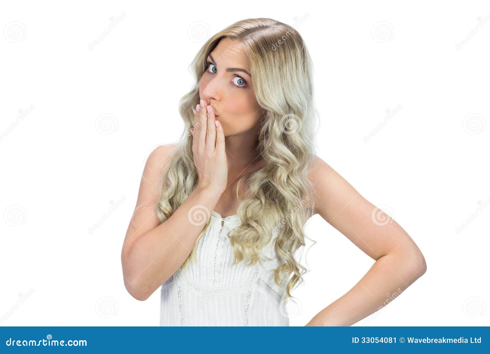 Seductive Model In White Dress Posing Hand On Her Mouth Stock Image