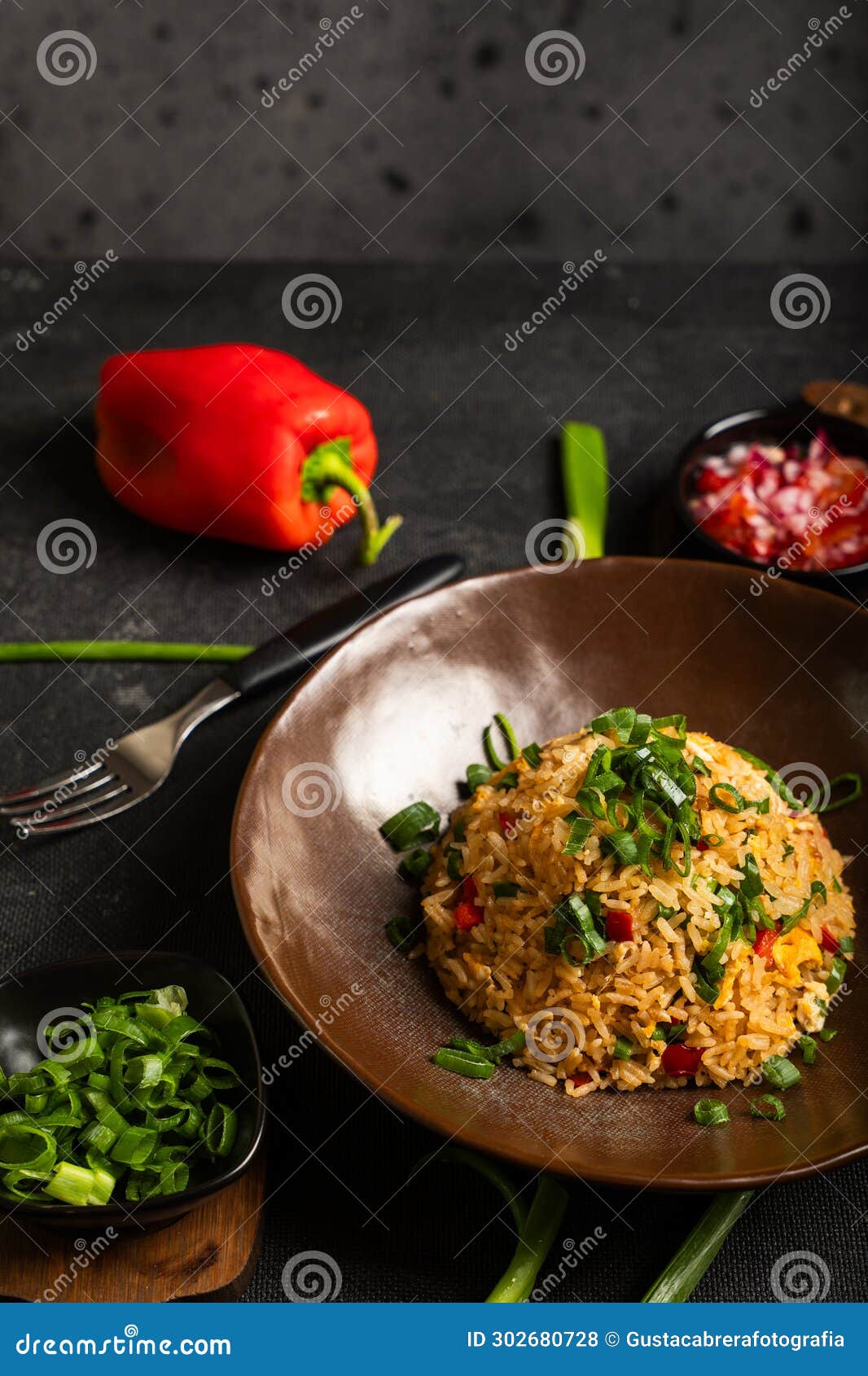 colorful dish of peruvian gastronomy called arroz chaufa.