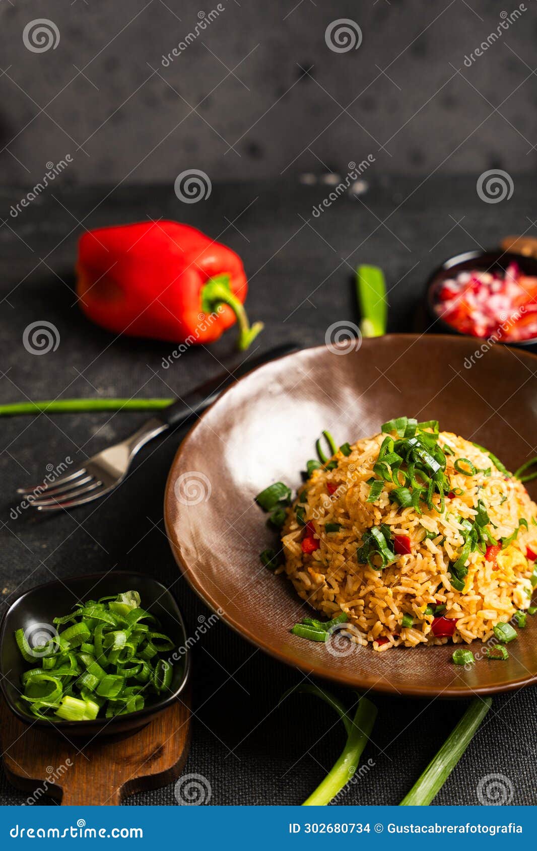 colorful dish of peruvian gastronomy called arroz chaufa.