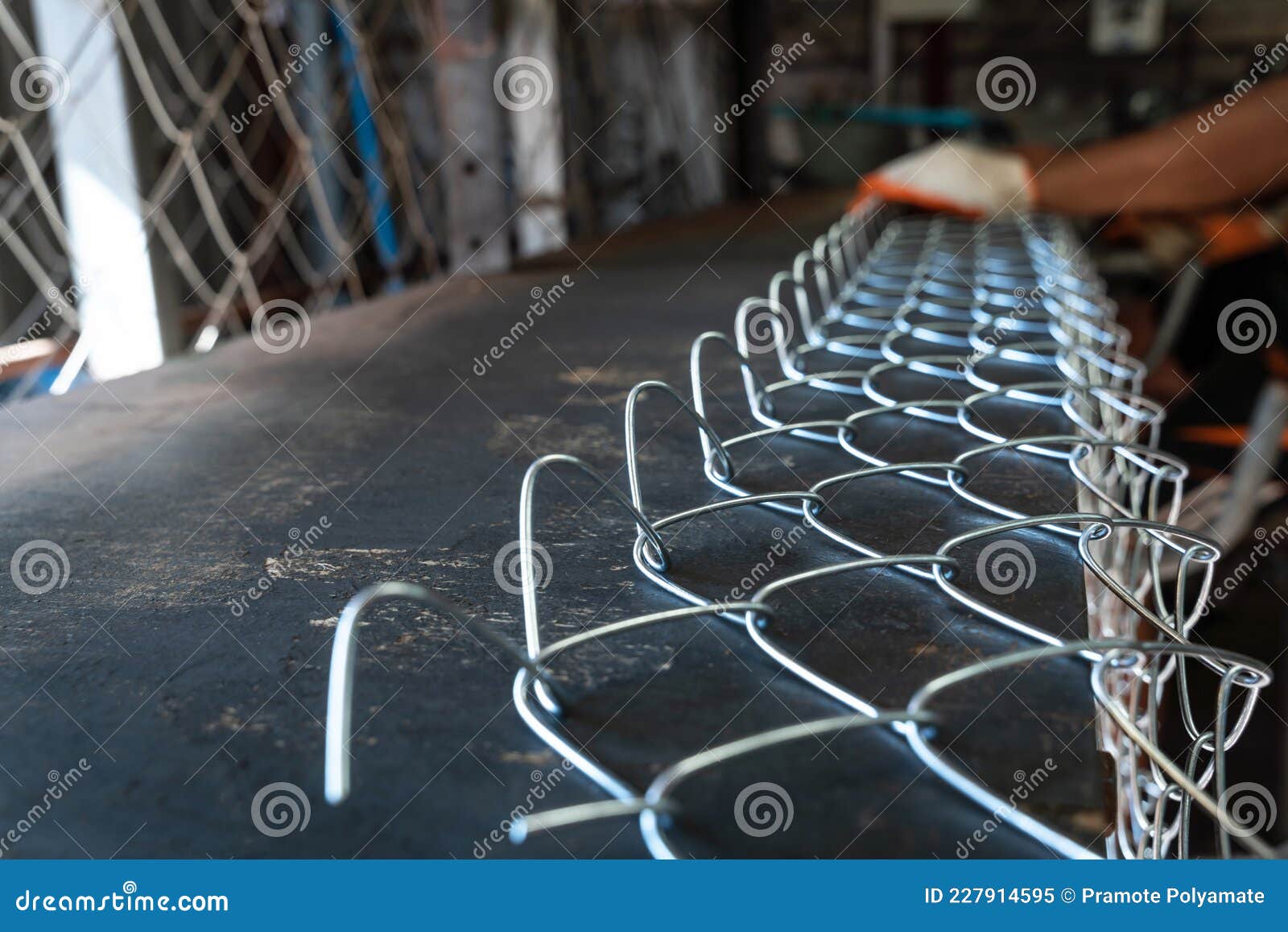 Select Focus Steel Wire Mesh, Workers Producing Wire Mesh Stock Image