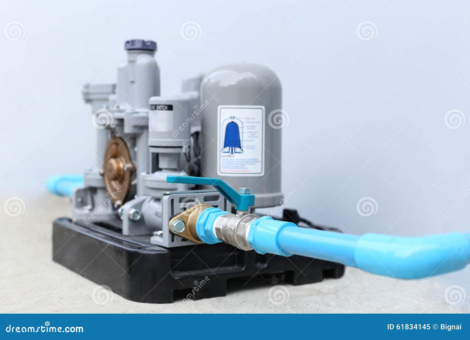 Selected Focus Automatic Water Pump with Blue Pipeline Isolated Stock