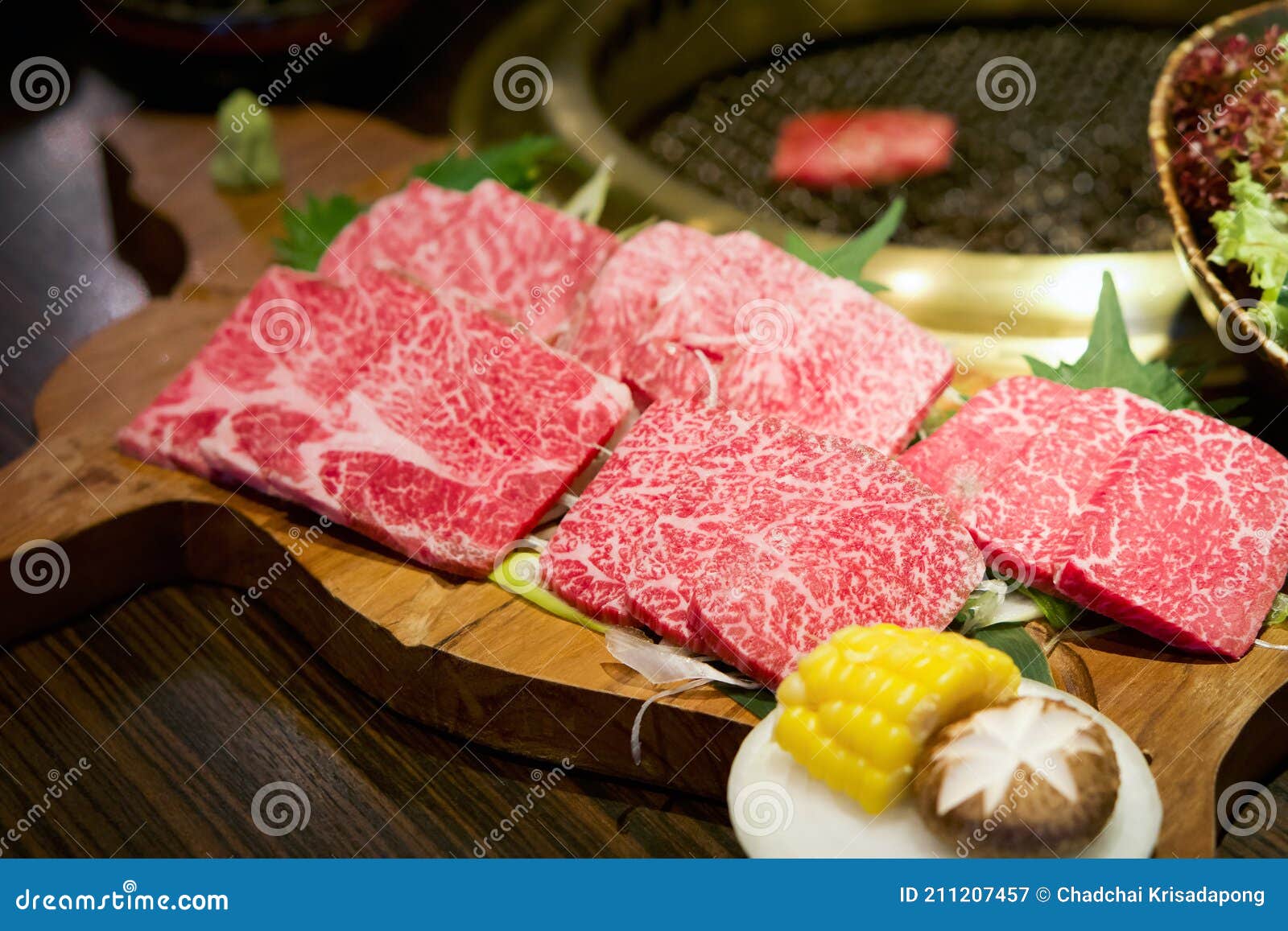 selected omakase wagyu mori served on wooden plate. tokujyo rosu, jyo karubi, omi momo and omi ichibo