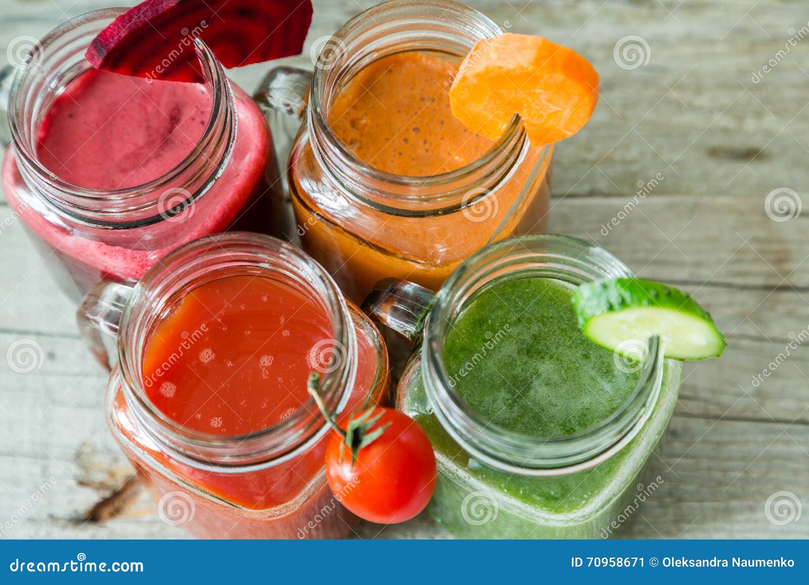 Selection of Colorful Vegetable Juices in Glass Jars Stock Image