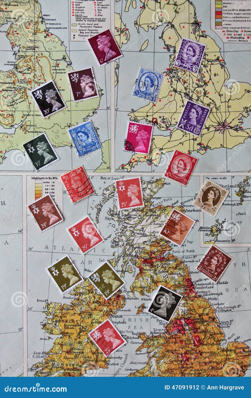 Selection of GB Postage Stamps Over Old Map Editorial Photography