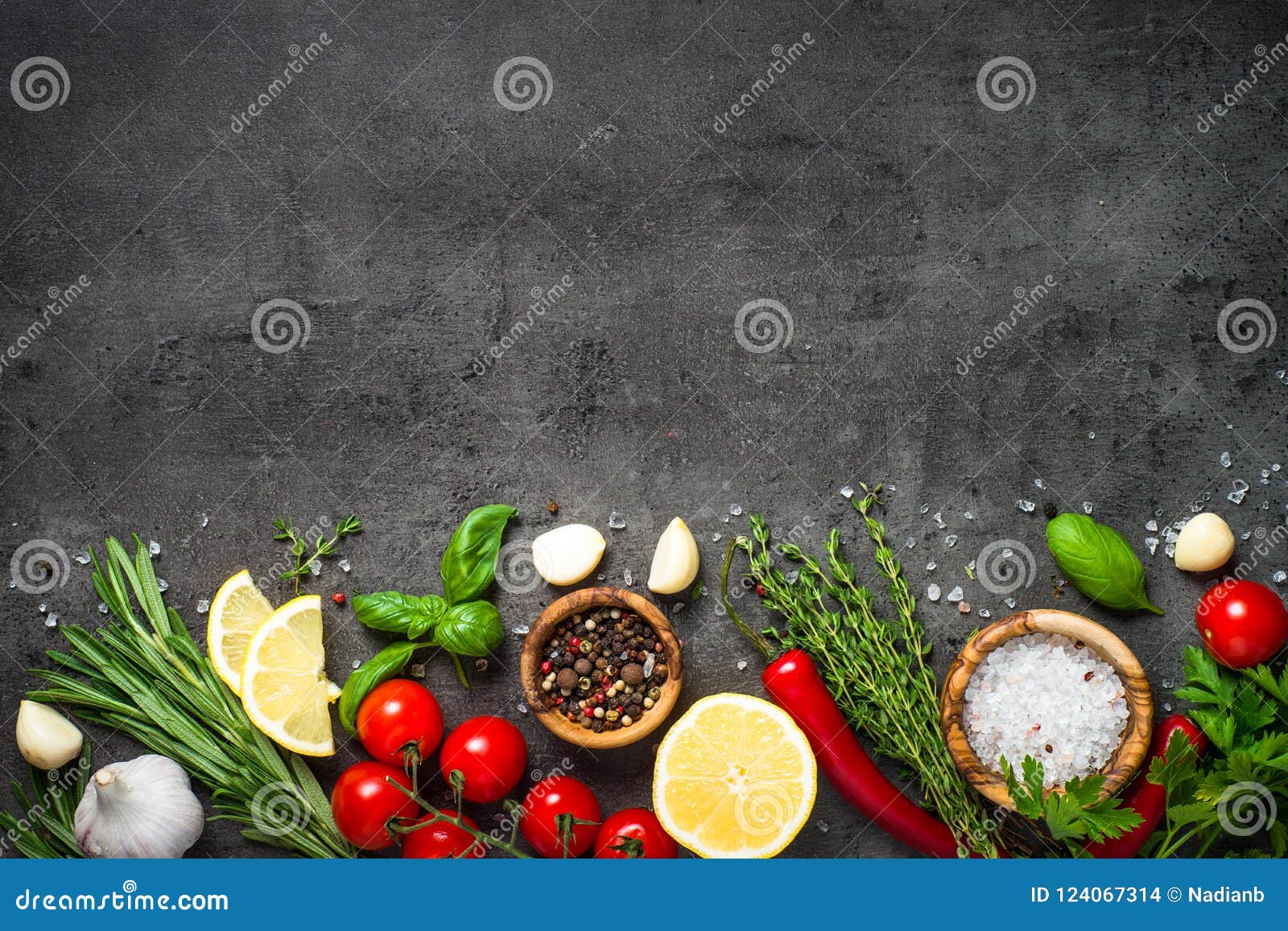 Selection of Spices Herbs and Vegetables on Black Top View. Stock Photo ...