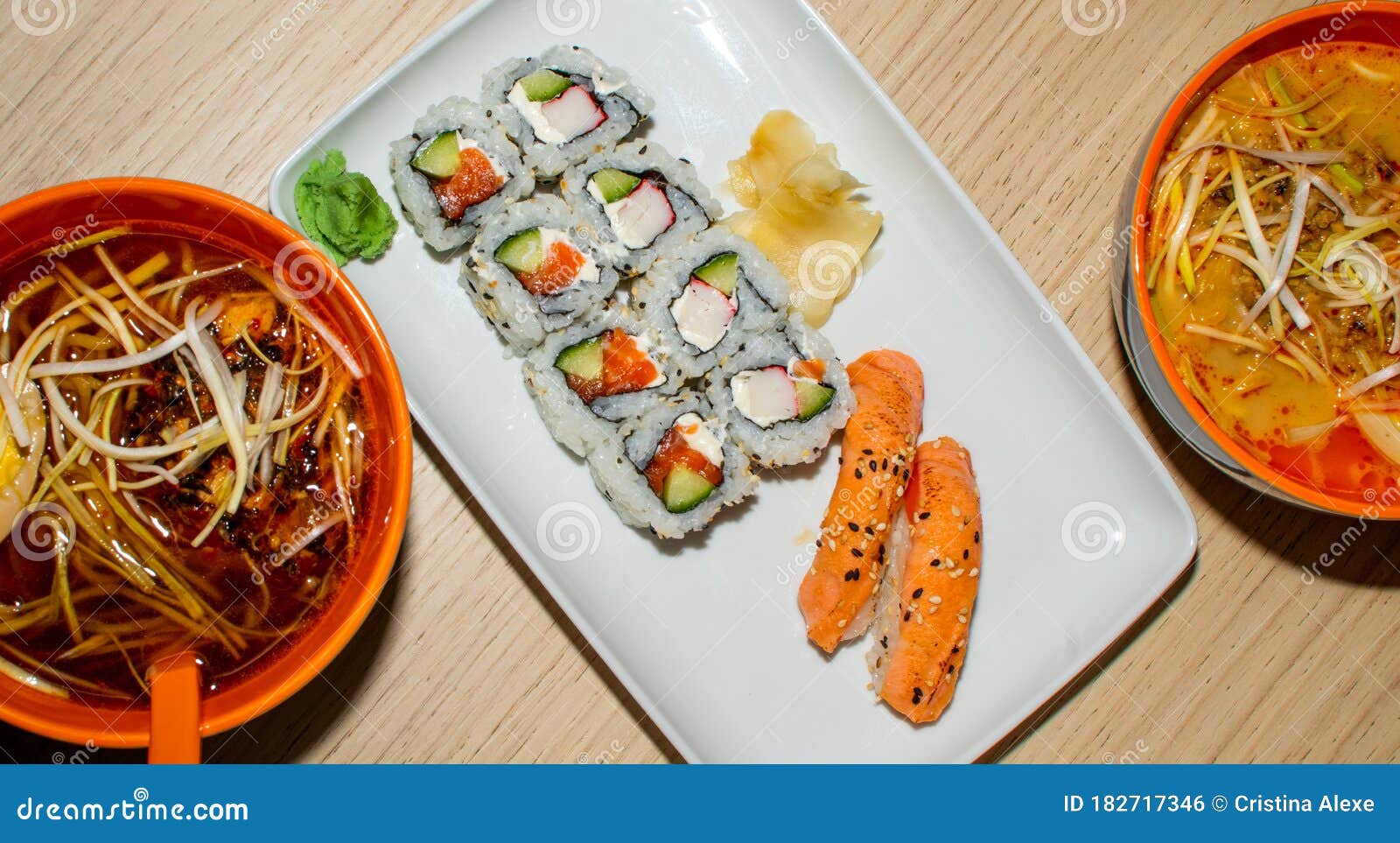 A Selection of Sushi Rolls with Salmon, Tuna, Cucumber and Soy Sauce