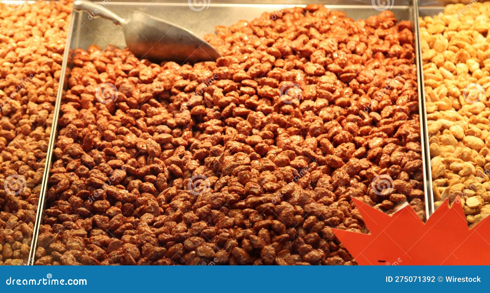 Selection of Various Types of Nuts are Displayed in a Market Stock